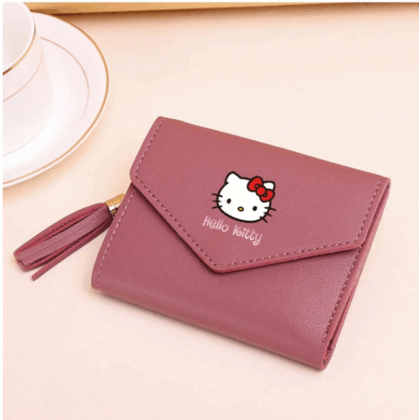 Screenshot 2025-07-27 5.15.26 PM Sanrio Hello Kitty Women’s Mini Wallet – Compact Tri-Fold with Tassel Charm