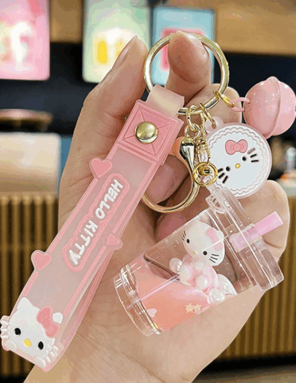 Sanrio Hello Kitty Glitter Keychain – Floating Pink Charm with Daisy Accent