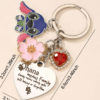 Screenshot 2025-07-27 6.31.44 PM Disney Stitch Flower & Rhinestone Heart Keychain